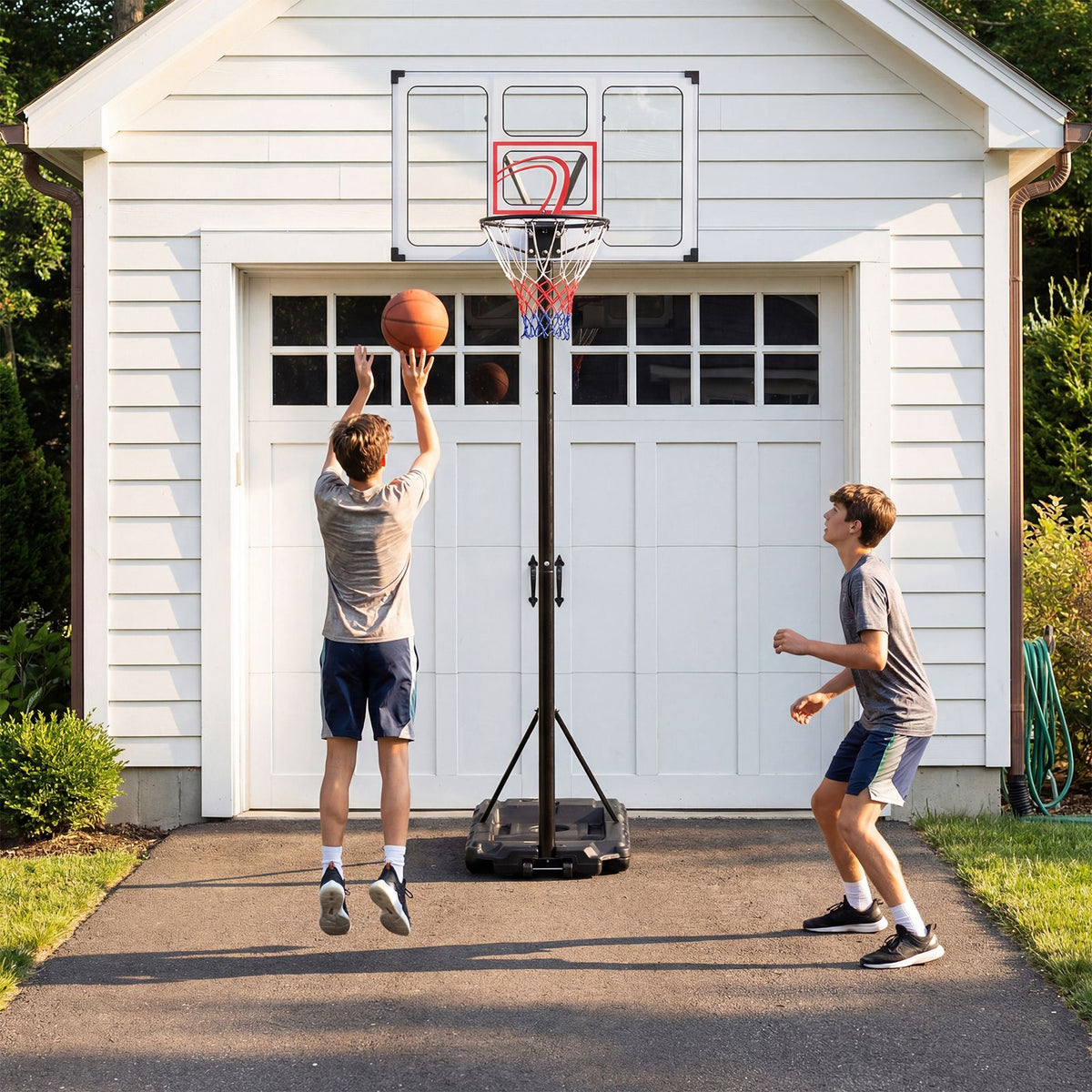 Adjustable Basketball Goal System with Wheels and Ball Storage for Kids