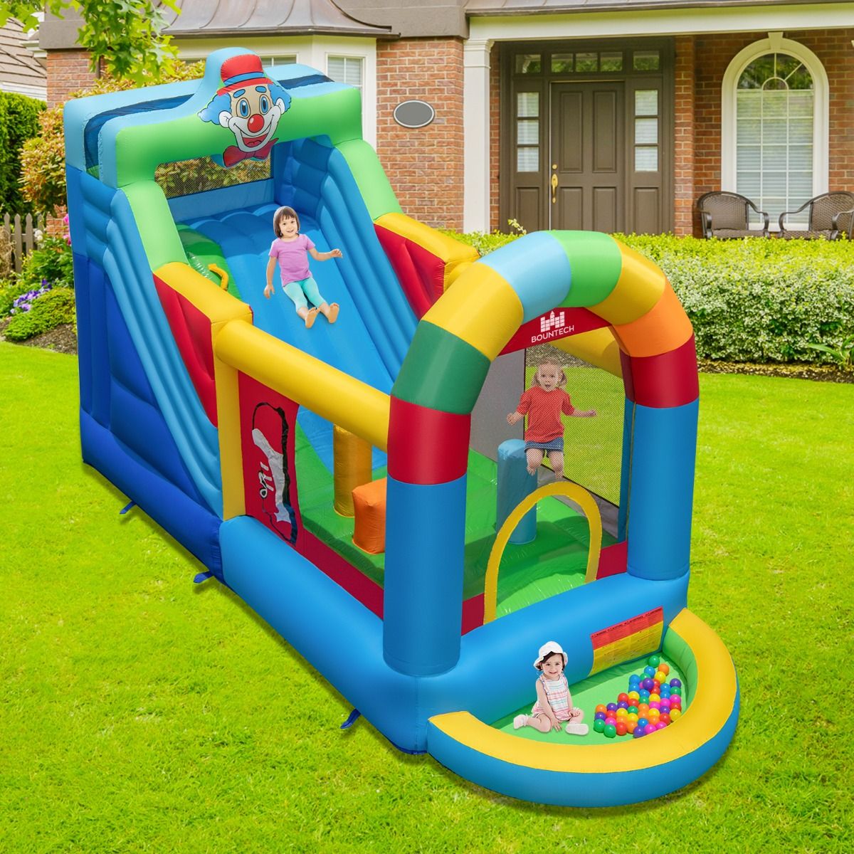 Clownland Bouncy Castle with Climbing Surface and Long Slide