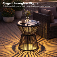 Outdoor Side Table with LED Warm Light, PE Rattan Hourglass-Shaped End Table with Tempered Glass Top